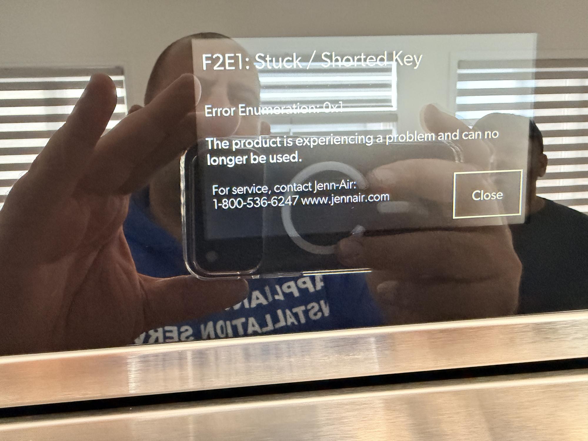 appliance oven repair aurora reflection person taking applianceforever ca