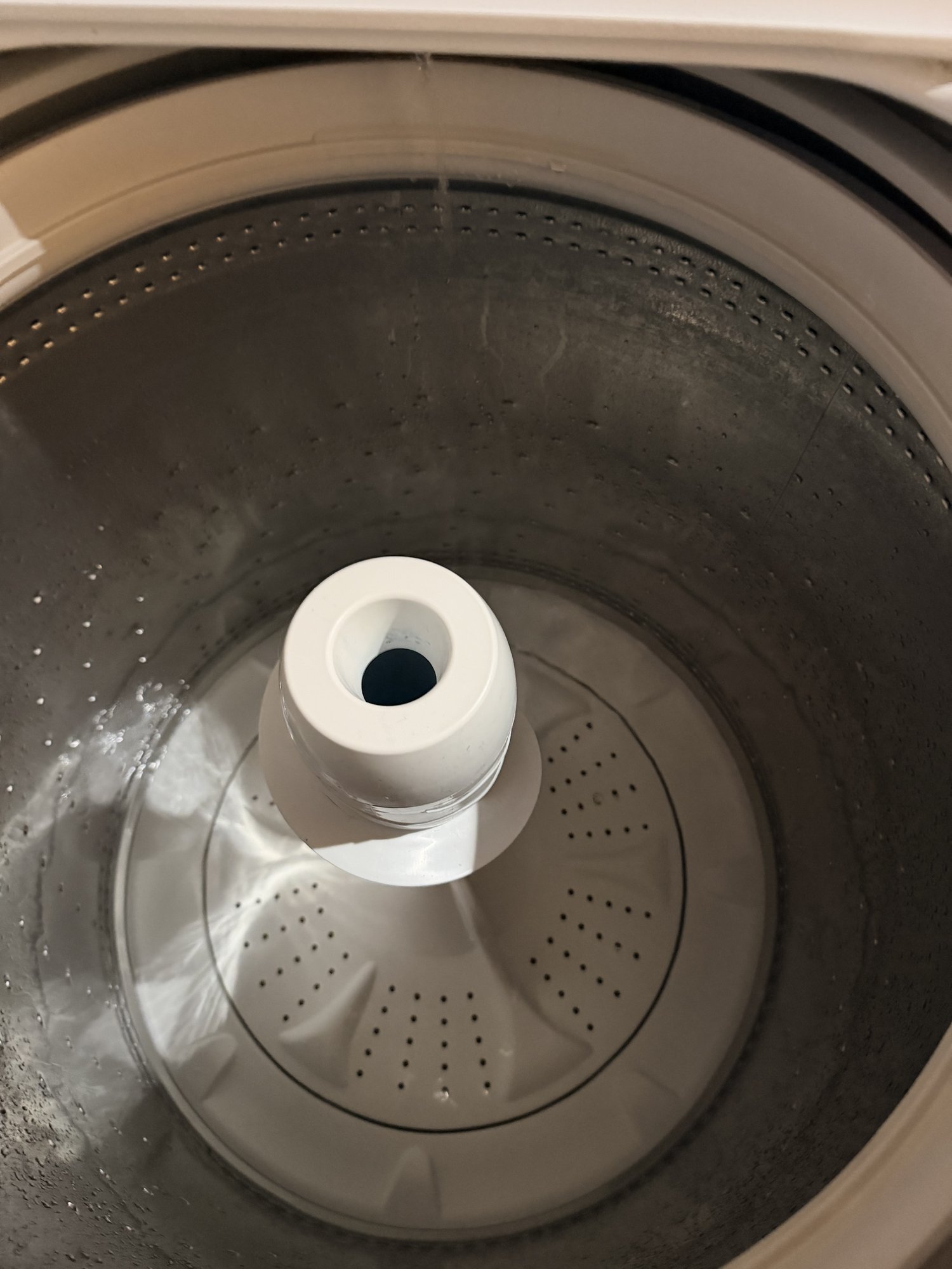 A bubble level on top of a Samsung washer used to fix the DC error code by adjusting front feet