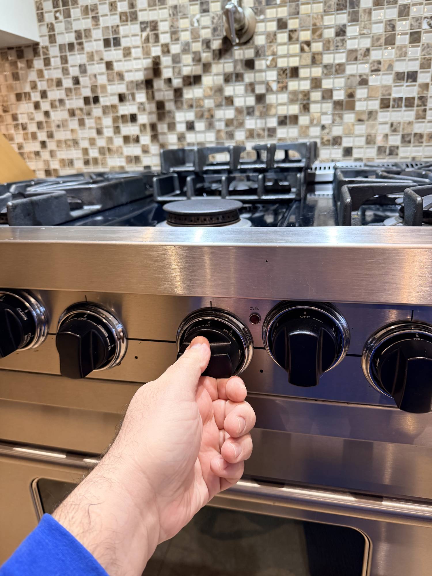 appliance stove repair maple hand wearing blue applianceforever ca