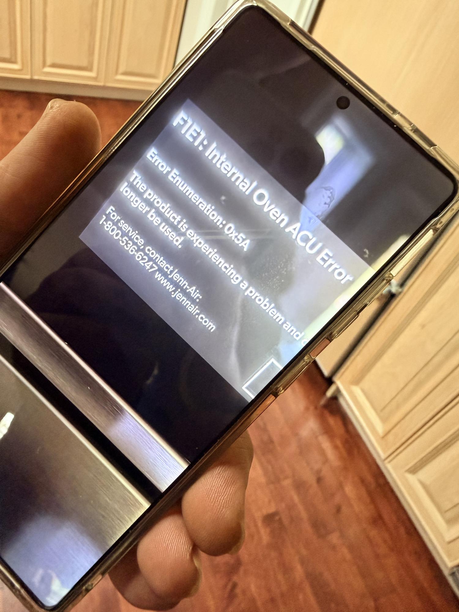 ge oven repair bradford hand holds smartphone applianceforever ca