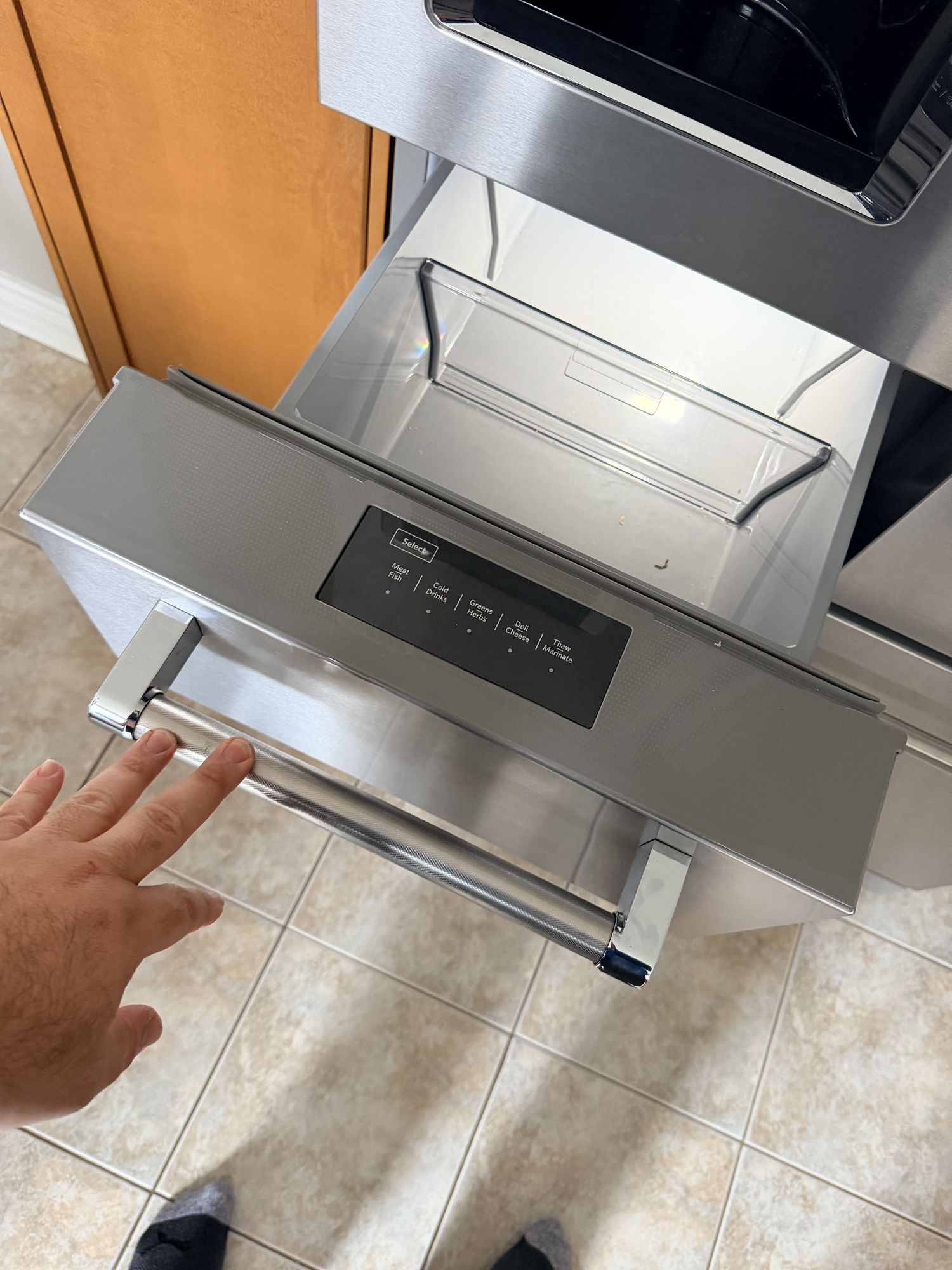 ge refrigerator repair king city hand reaching to applianceforever ca